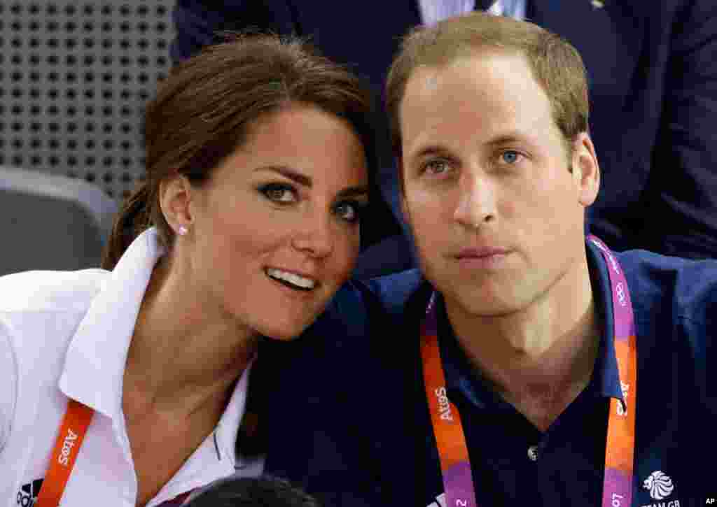 Prince William and his wife Kate watch track cycling at the velodrome.