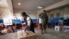 Polls open in Ecuador with conservative incumbent and leftist lawyer leading presidential race 