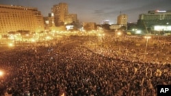 Thousands of demonstrators protest in central Cairo to demanding the ouster of President Hosni Mubarak and calling for reforms. (Jan. 25, 2011)