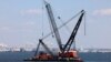 Focus shifts to weighty job of removing collapsed Baltimore bridge
